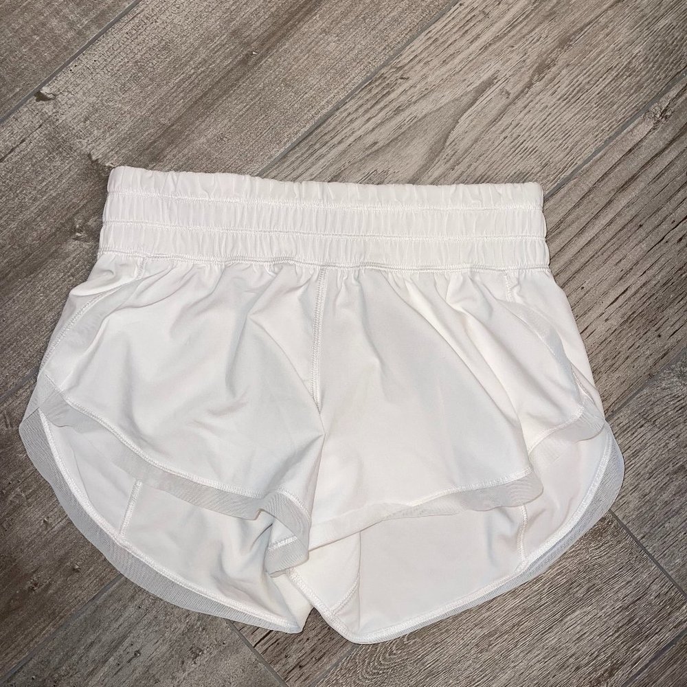 Lululemon white running shorts w/ Mesh along edges